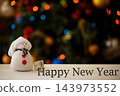 White snowman on a Christmas tree background 143973552