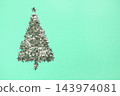 Christmas tree made of golden stars glitter confetti on red background. Xmas holiday backdrop. 143974081