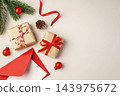 Gift boxes and christmas ornaments on beige background, copy space, top view 143975672