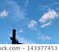 Blue sky, clouds, telephone poles 143977453