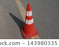 traffic cone on the road 143980335