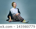 Studio portrait of a girl in casual clothing 143980779