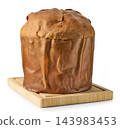 Artisan panettone with nuts and dried fruit 143983453
