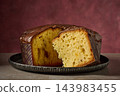 Panettone with caramel covered with chocolate 143983455