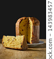 Artisan panettone with nuts and dried fruit 143983457
