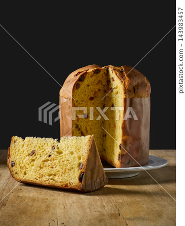 Artisan panettone with nuts and dried fruit 143983457