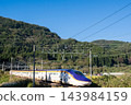 [Yamagata Shinkansen] The Limited Express Tsubasa passes through the autumn countryside of Niwasaka. 143984159