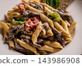 Pasta with Sliced Beef Steak Served on a Plate. 143986908