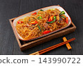 chinese Stir-Fried Rice Vermicelli with Pork Cheek and Bok Choy on Plate 143990722