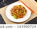 savory Stir-Fried Rice Vermicelli Noodles with Braised Pork Head Meat and Vegetables 143990724