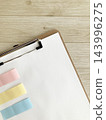 Clipboard with colorful sticky notes, white paper, schedule management, to-do lists, business tasks management. 143996275