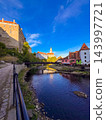 Castle of Cesky Krumlov in Czechia built on a cliff overlooking the Vltava River 143997721