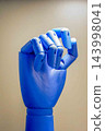 Blue hand mannequin 143998041