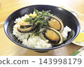 Local cuisine: Donburi (rice bowl) with abalone caught locally. 143998179