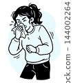 sick woman sneezes. mild symptoms of colds and runny nose. seasonal cold or virus 144002264
