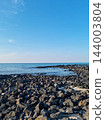 This is a Jeju seascape with basalt rocks. 144003804