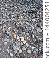 Top view of floor with round basalt rocks 144004251