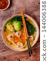 Soup with wontons and bok choy 144006388