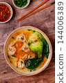 Soup with wontons and bok choy 144006389