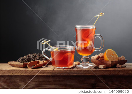 Black tea with lemon and brown sugar. 144009030