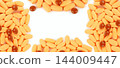 Horizontal layout of orange medicine pills and brown tablets forming rectangular frame isolated on white background 144009447