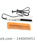 view of white hair straightener with power cord and wooden comb isolated on white background with copy space 144009451