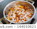 boiled forest mushrooms 144010621