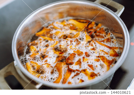 boiled forest mushrooms 144010621