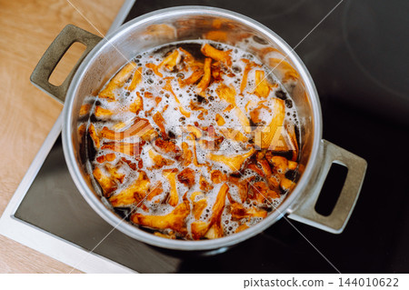 boiled forest mushrooms boiled forest mushrooms 144010622