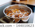 boiled forest mushrooms 144010623