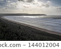 View towards Baggy Point and the setting sun from Woolacombe beach, Devon 144012004