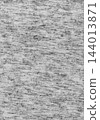 Grey cotton t-shirt fabric close up texture. Soft heathered grey fabric 144013871