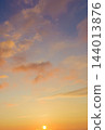 Sunrise northern sky and sun over distant horizon 144013876