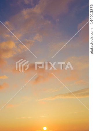 Sunrise northern sky and sun over distant horizon Sunrise northern sky and sun over distant horizon 144013876