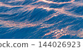 Ocean Waves Surface Blue Storm Winter Water Sunset Light Reflection 3D Render 144026923