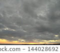 Rain Clouds in Blue Gray Grey Sky On The Beach 144028692