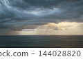 Tropical Storm Clouds Over The Ocean 144028820
