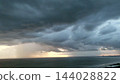Tropical Storm Clouds Over The Ocean 144028822