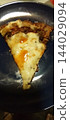 top view of homemade skillet cheese pizza in black skillet 144029094