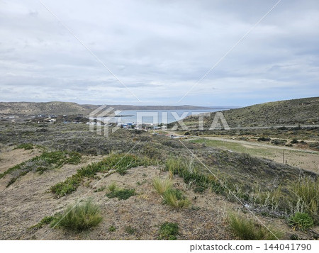 Puerto Piramides, Argentina - October 12, 2026: Coastal hills overlooking the bay. 144041790