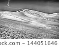 Ski resort with chairlifts and skiers, Campocatino, Italy 144051646