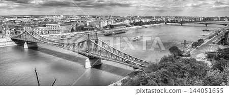 Liberty Bridge and Danube River, Budapest Cityscape under Cloudy Sky Liberty Bridge and Danube River, Budapest Cityscape under Cloudy Sky 144051655